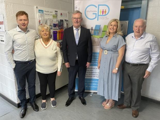 Health Minister Mike Nesbitt with Rathkeeland House Surgery partners Drs Kevin and Brid Allen and their parents, Dr Mary Allen and Mr Paddy Allen. 
